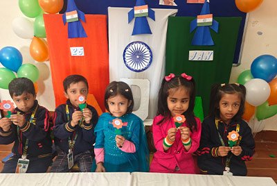 Primary students exploring a wooden educational toy