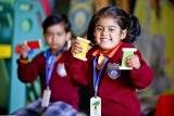 Teacher guiding students at Geeta Jyoti School