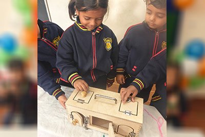 Students at a science exhibition at Geeta Jyoti School